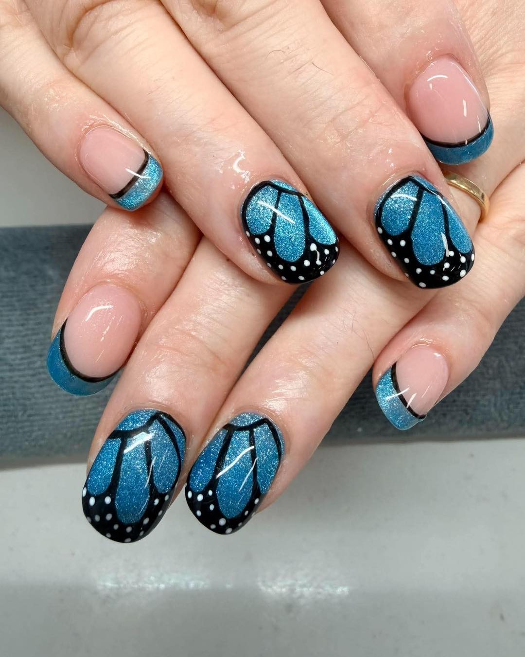 Blue cat eye butterfly nail art