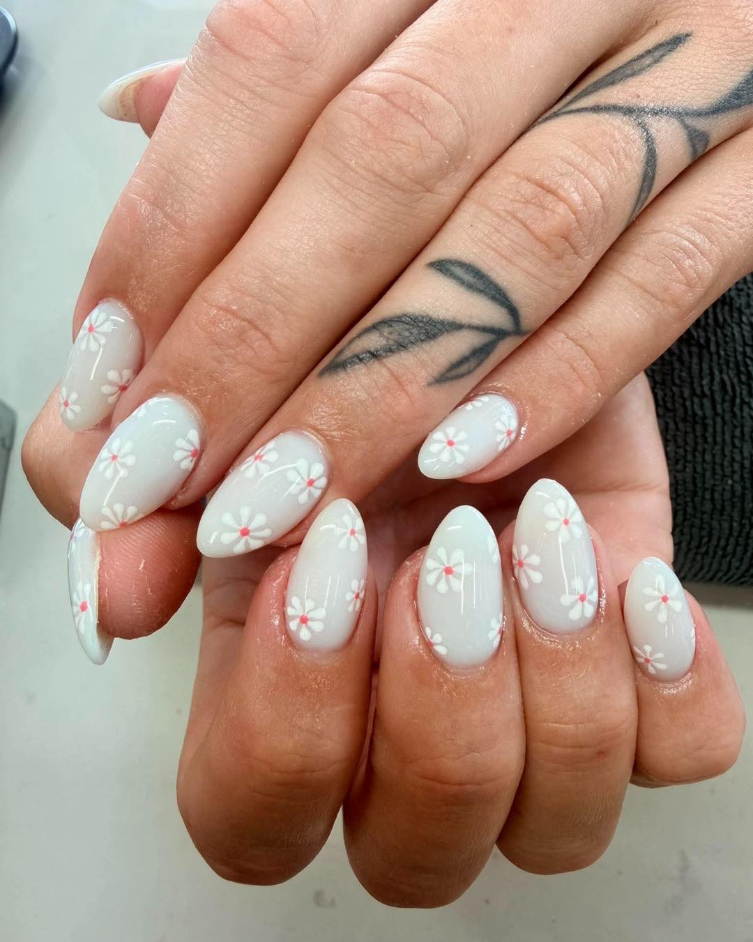 Daisy flower and polka dot nail art