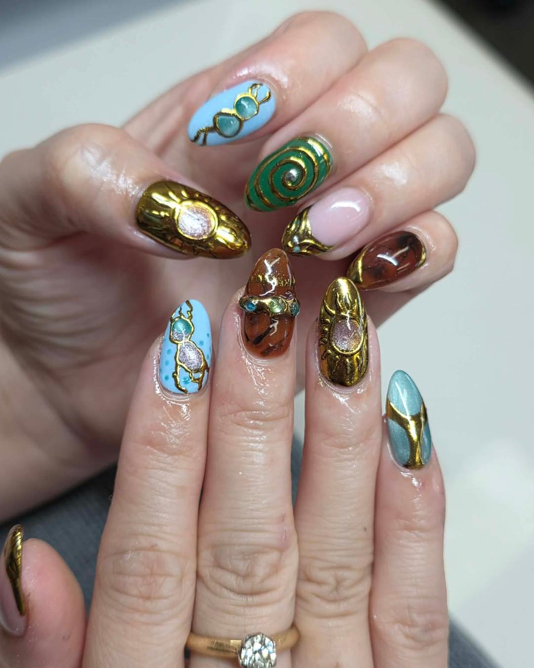 Liquid gold chrome 3D sculpted nail art